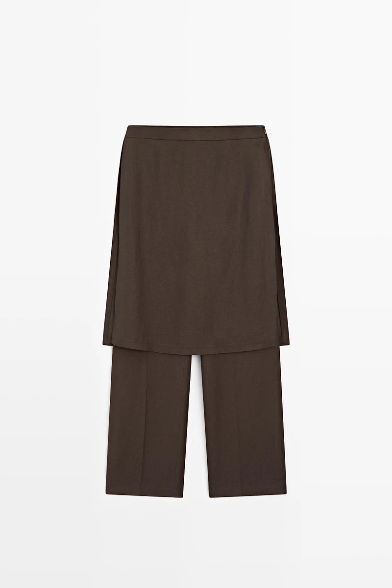 Flowing trousers with skirt detail