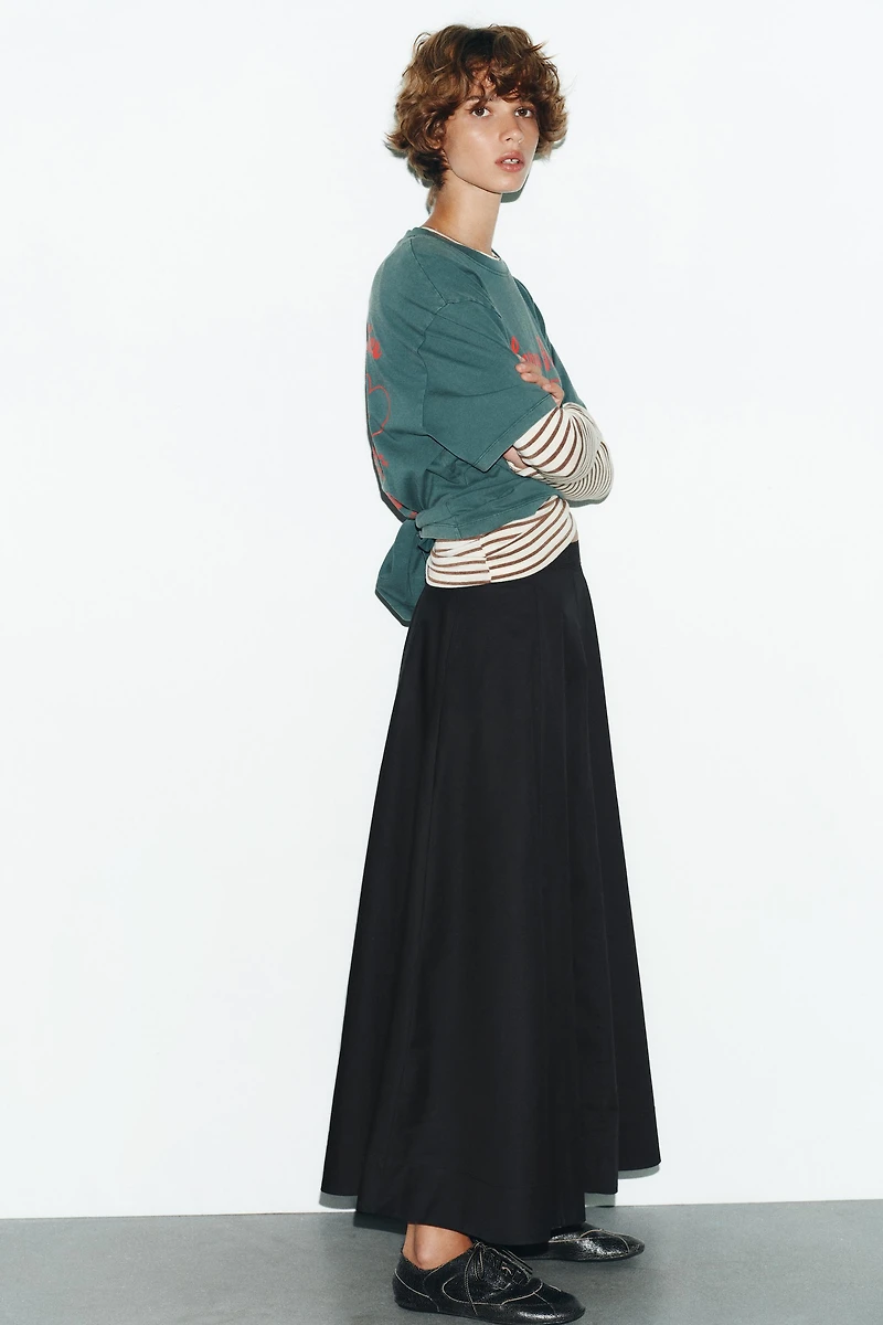 PLEATED MIDI SKIRT