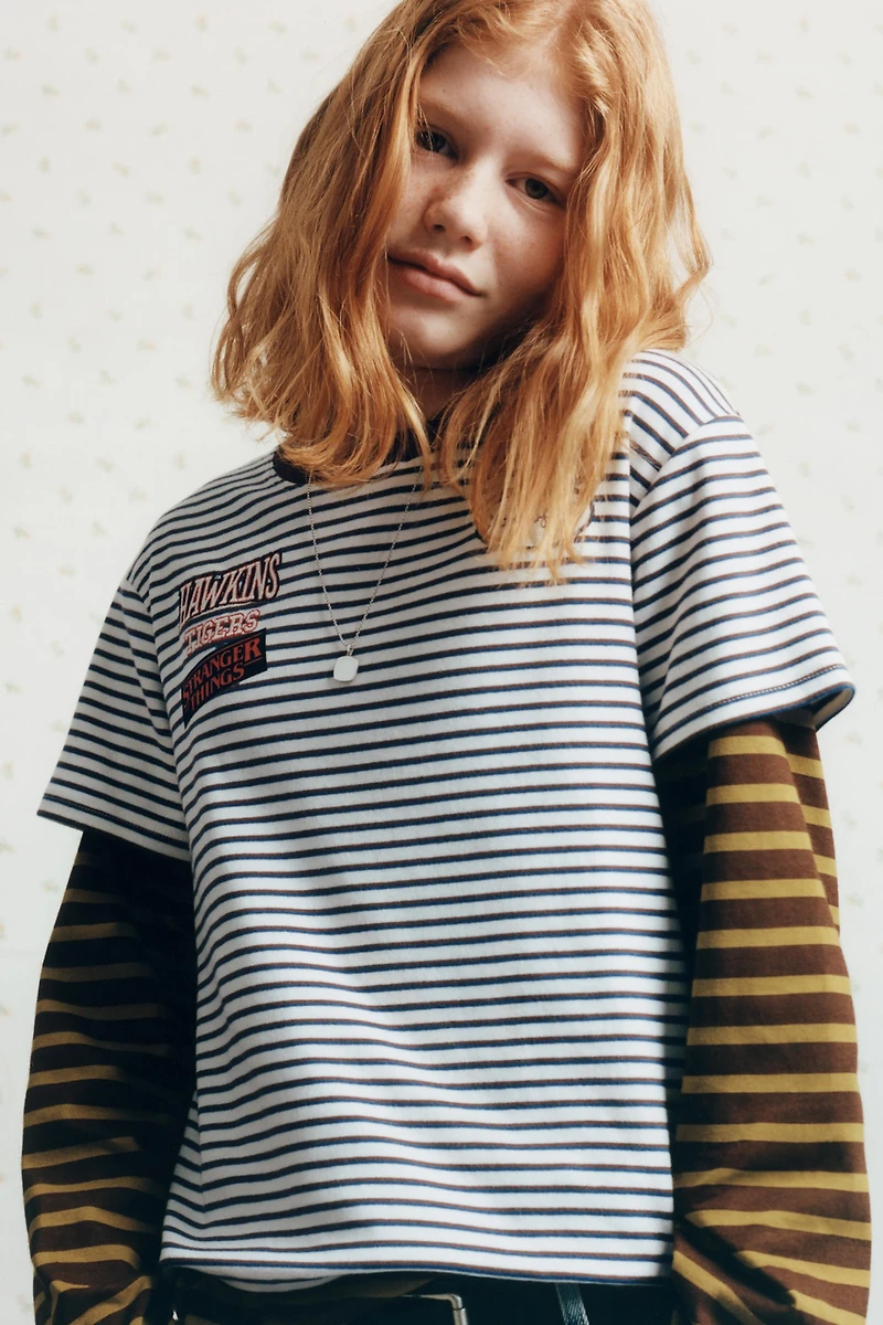 STRIPED STRANGER THINGS © NETFLIX T-SHIRT