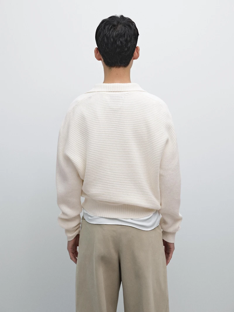 Knit sweater with mock button neck