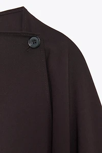 ASYMMETRIC BUTTON CAPE