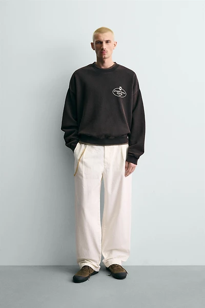 WASHED SWEATSHIRT WITH PRINTED TEXT