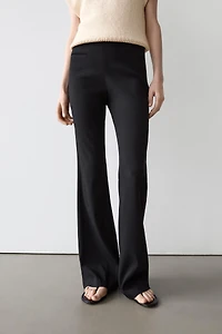 Flared trousers with pocket