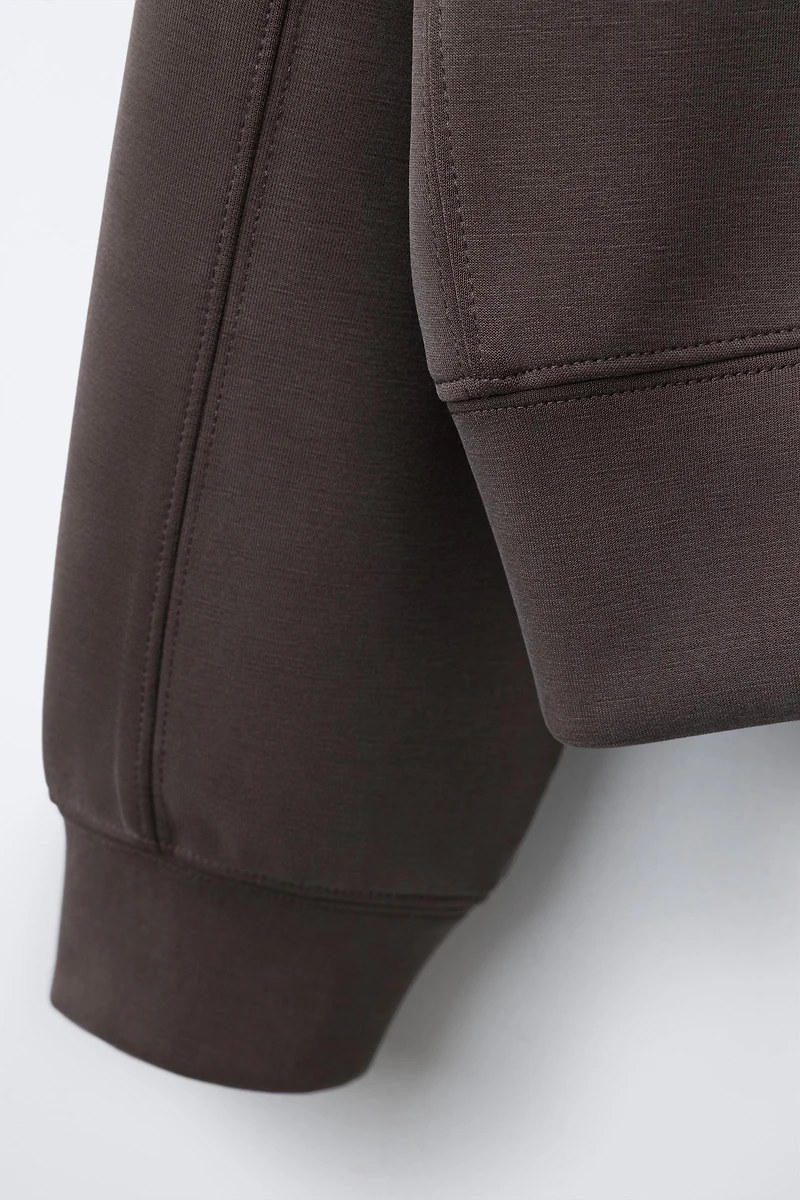 SPORTY RAISED TEXT SWEATSHIRT