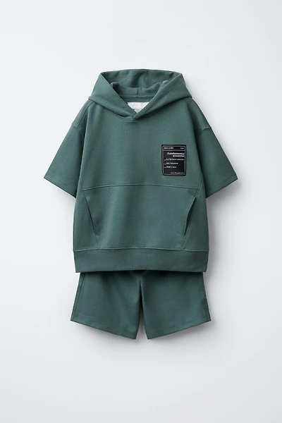 SHORT SLEEVE HOODIE AND INTERLOCK BERMUDA SET