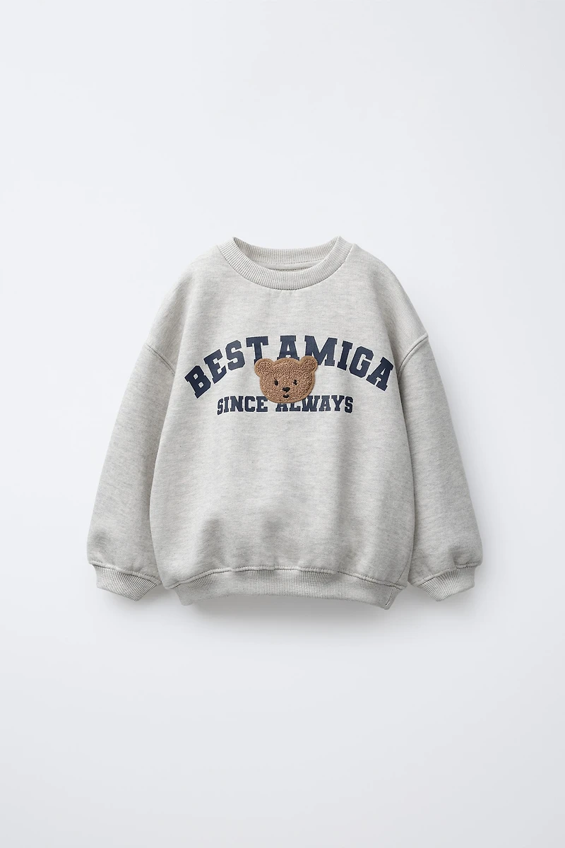 VARSITY TERRY PATCH APPLIQUÉ SWEATSHIRT