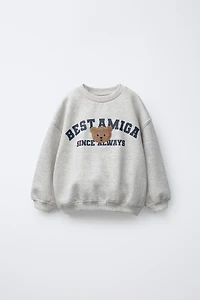 VARSITY TERRY PATCH APPLIQUÉ SWEATSHIRT