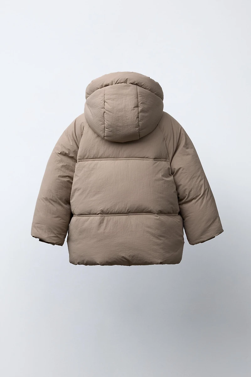 MANTEAU MATELASSÉ CAPUCHE DÉPERLANT