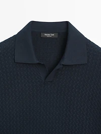 Polo en maille torsadée à col V