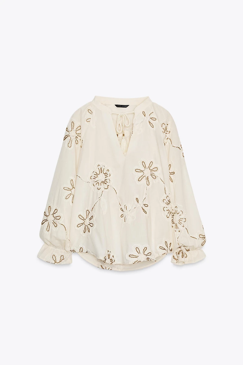 TEXTURED EMBROIDERED BLOUSE