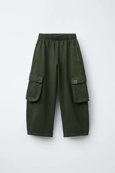 PANTALON EN MOLLETON LARGE CARGO TEINT PIÈCE
