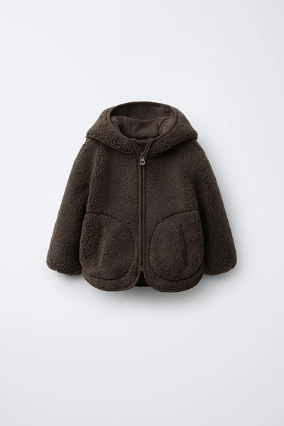 VESTE EFFET MOUTON À CAPUCHE