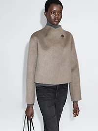 Manteau court finition brossée