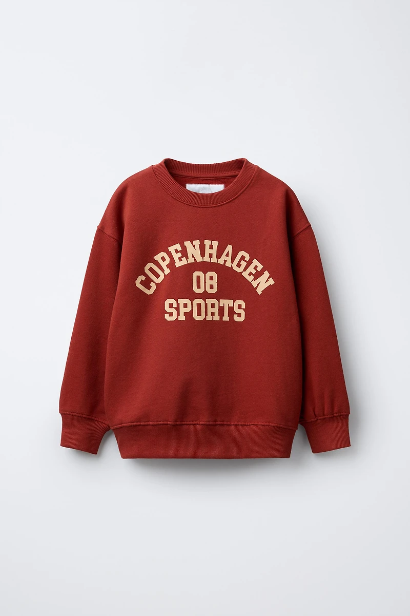 VARSITY PRINT SWEATSHIRT