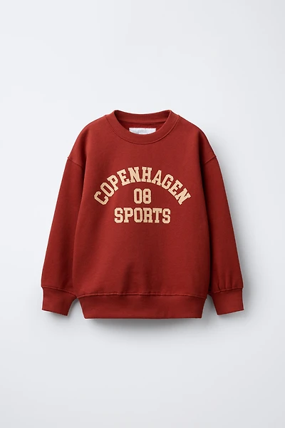 VARSITY PRINT SWEATSHIRT