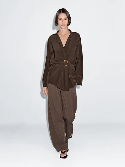 Long shirt with brooch detail