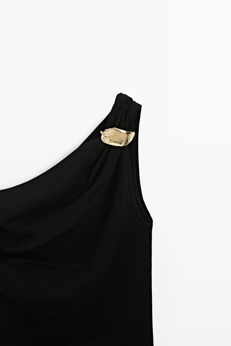 Asymmetric top with metal detail