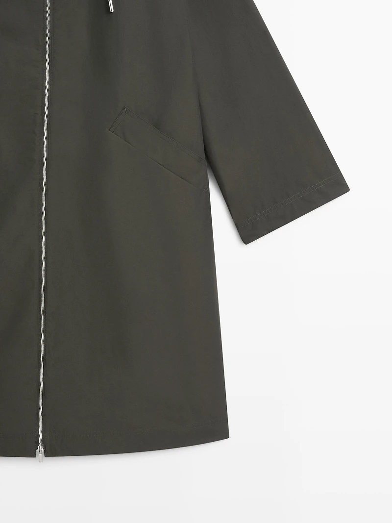 Technical fabric trench coat with hood