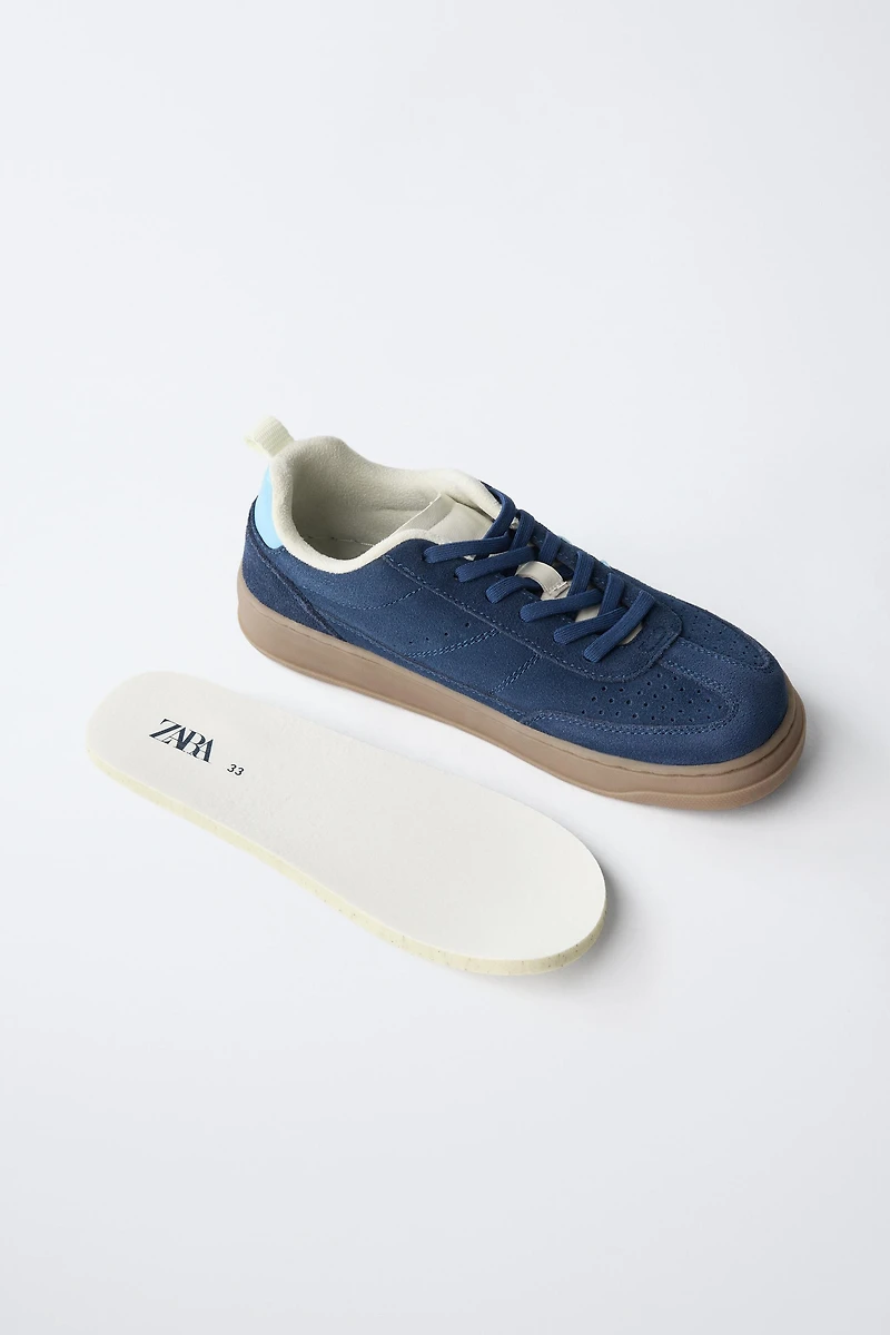 TENNIS EN CUIR PIEDS NUS