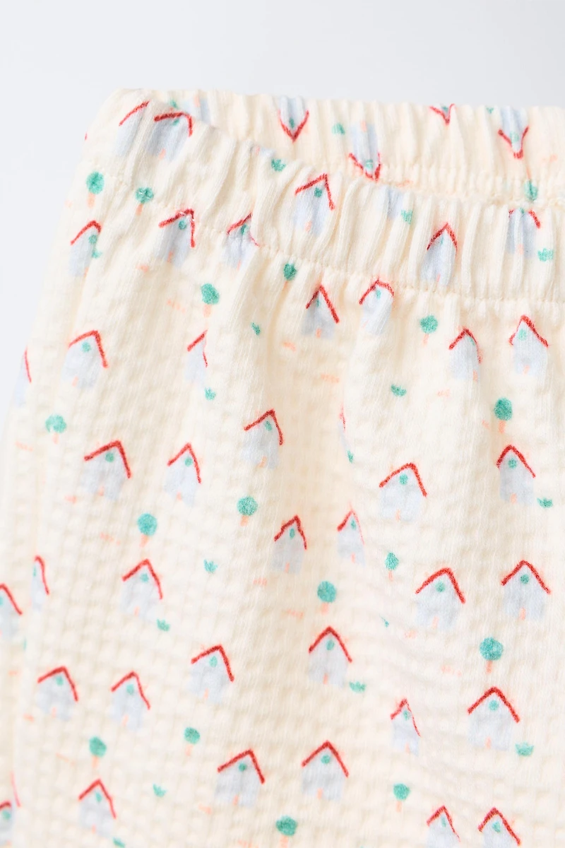 HOUSE PRINT BAGGY PANTS