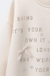 RHINESTONE TEXT SWEATSHIRT