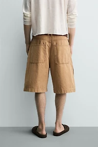 BERMUDA BAGGY FIT À BOUTONS