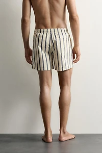 STRIPED MID-LENGTH SWIM SHORTS