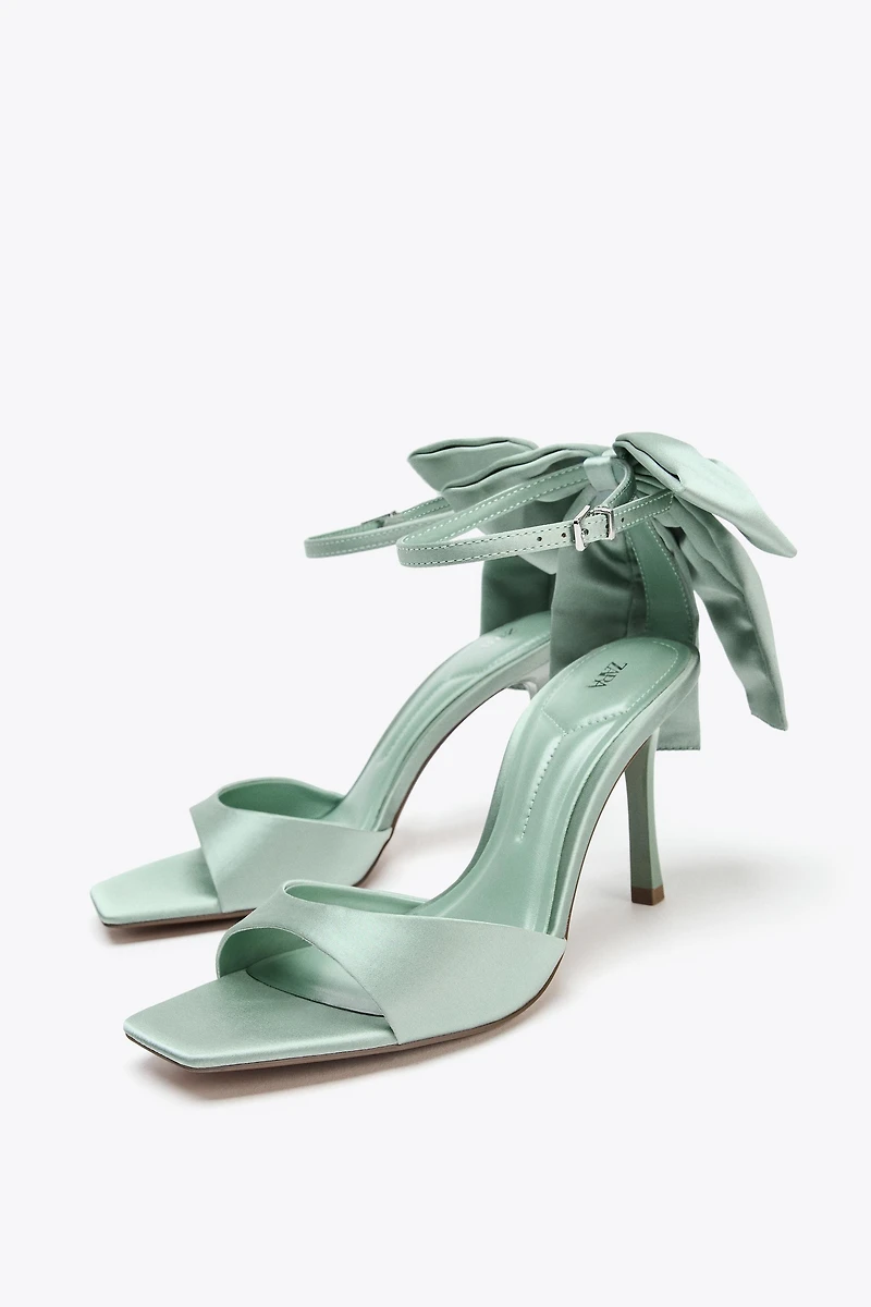 MAXI BOW HEELED SANDALS