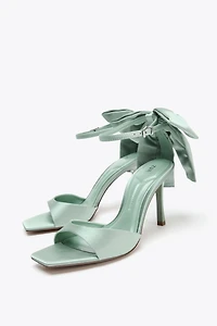 MAXI BOW HEELED SANDALS