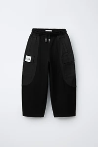 COMBINATION PANTS WITH LABEL