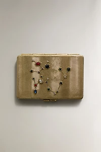 PETIT MIROIR SAGITTAIRE | MARISA BERENSON