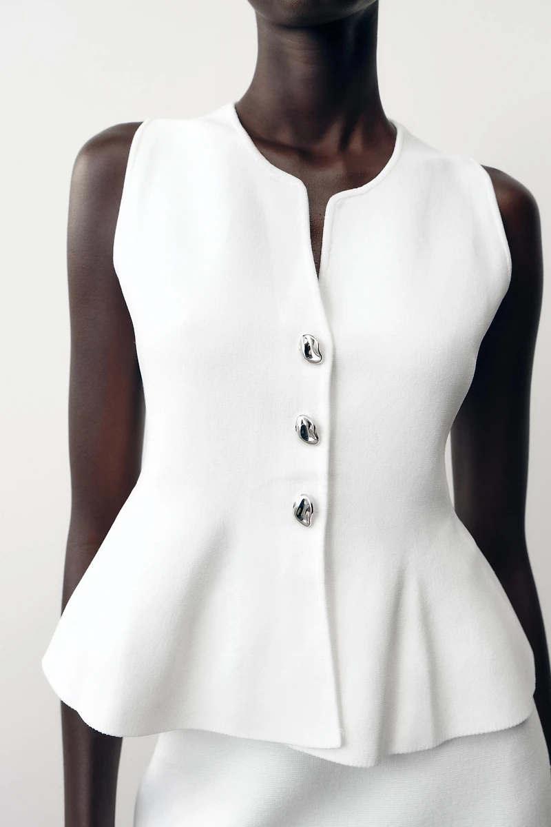 TOP EN MAILLE PÉPLUM