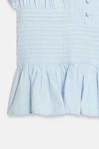 BLOUSE À PLIS NERVURÉS ET MANCHES BOUFFANTES