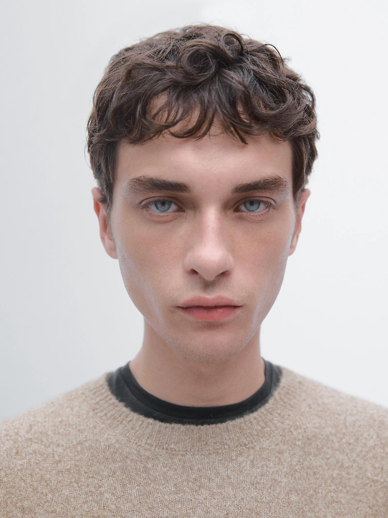 Flecked crew neck knit sweater