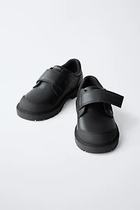 CHAUSSURES EN CUIR
