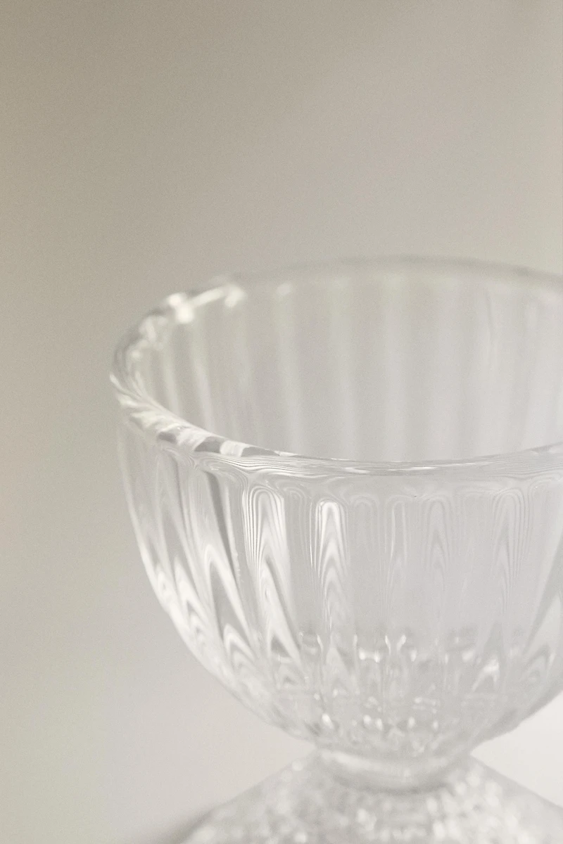 GLASS EGG CUP WITH A RAISED GEOMETRIC DESIGN