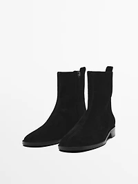 Bottines plates en croûte de cuir