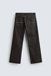 WAXED FLARE FIT JEANS