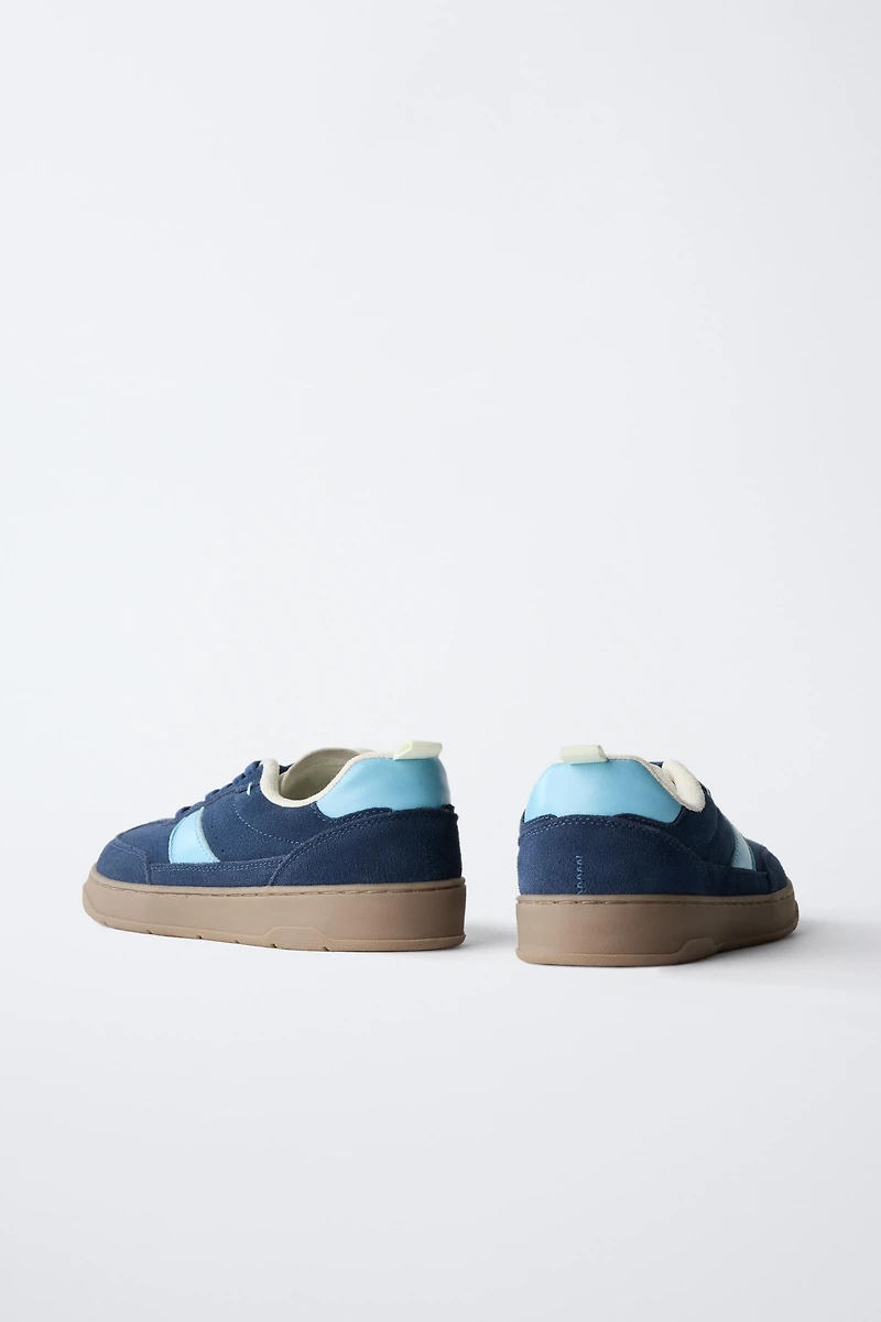 TENNIS EN CUIR PIEDS NUS
