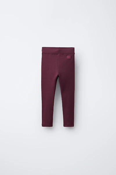 LEGGING CÔTELÉ À ÉTIQUETTE