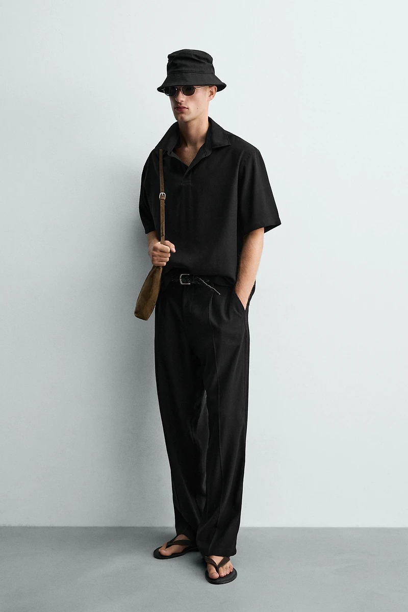 FLOWY RELAXED FIT PLEATED PANTS