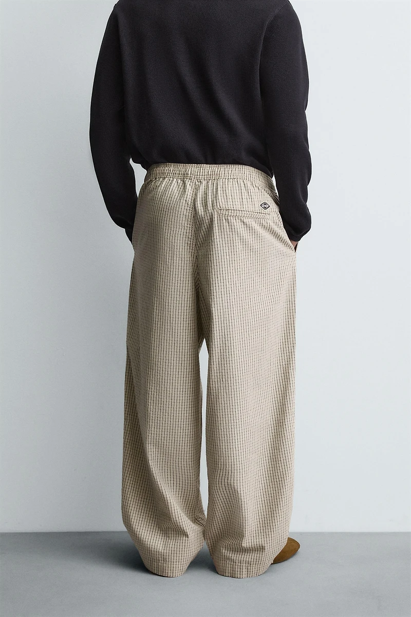 BALLOON FIT PLEATED PANTS