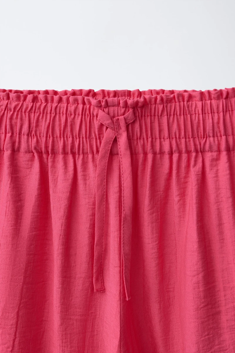 PANTALON À JAMBES LARGES EFFET FROISSÉ