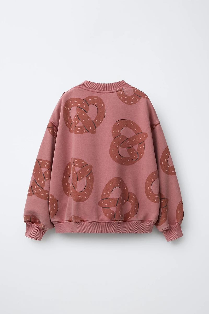 PRINTED PRETZEL SWEATSHIRT