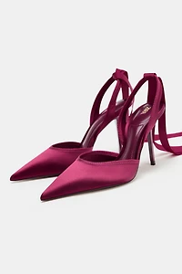 CHAUSSURES OUVERTES À TALONS ET BRIDES