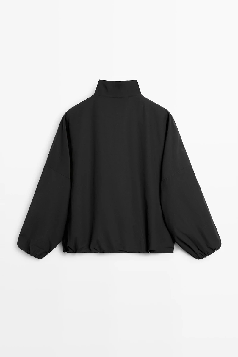 Cotton blend technical jacket with side button