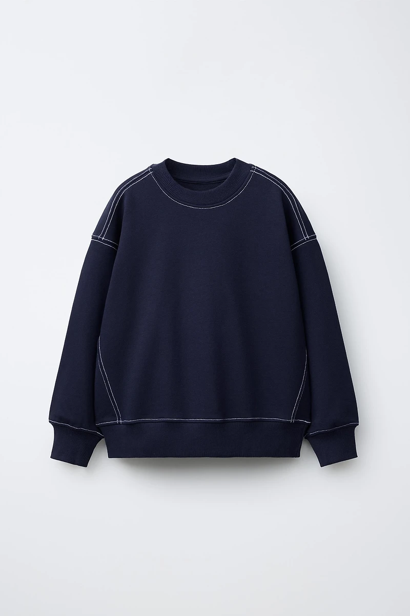 ENSEMBLE SWEAT ET PANTALON EN MOLLETON SURPIQUÉ