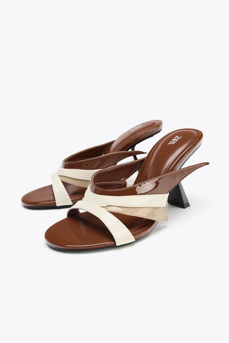 ASYMMETRIC HEELED SANDALS