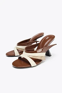 ASYMMETRIC HEELED SANDALS