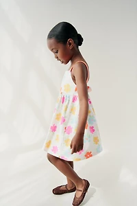 TEXTURED PRINTED BOW DRESS